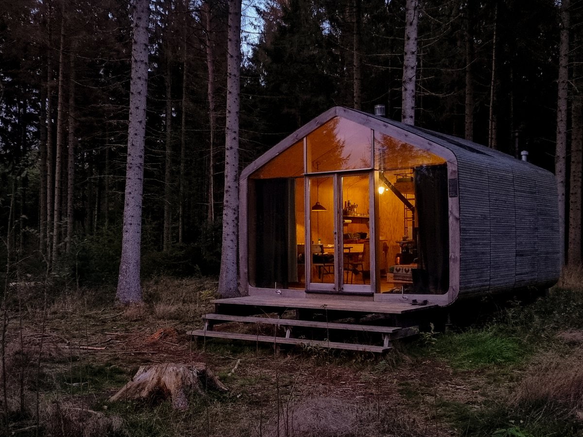 Wooden Hut in Autumn Forest in the Netherlands, Cabin off Grid ,Wooden Cabin Circled by Colorful Yellow and Red Fall Trees