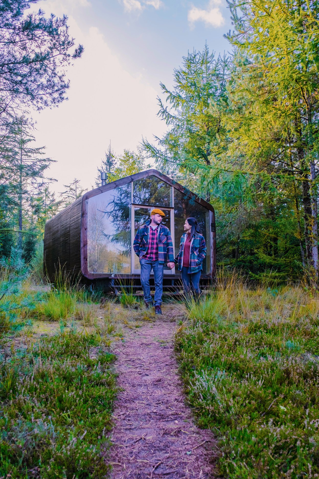 Wooden Hut in Autumn Forest in the Netherlands, Cabin off Grid ,Wooden Cabin Circled by Colorful Yellow and Red Fall Trees